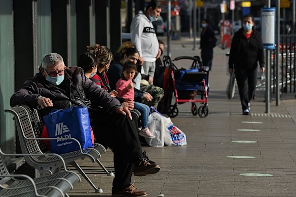 The wait for buses at Fairfield on Thursday during Sydney’s COVID-19 lockdown.