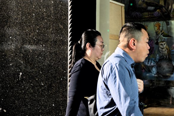 Jie Shao (left) arrives at court during her trial.