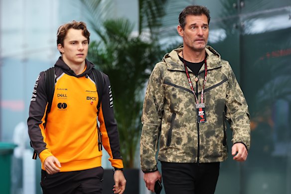 McLaren driver Oscar Piastri with his manager, former F1 racer Mark Webber.