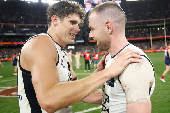 Charlie Curnow and Sam Docherty celebrate the Blues’ semi-final win on Friday night.