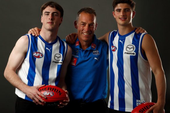 George Wardlaw (left) and Harry Sheezel with Alastair Clarkson after they were drafted last year.