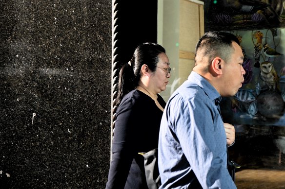 Jie Shao (left) arrives at court during her trial.