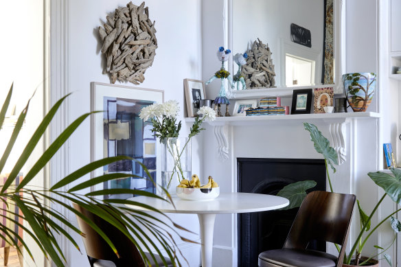 Position large potted plants to show off their sculptural qualities or line smaller ones on a sideboard.
