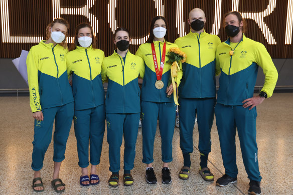 Members of the Australian Olympic moguls team on their arrival back in Melbourne: Kate Blamey, Britt Cox, Sophie Ash, Jakara Anthony, Brodie Cox, and Peter McNeil.