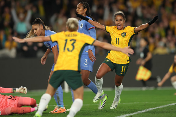 Mary Fowler celebrates her goal against France.