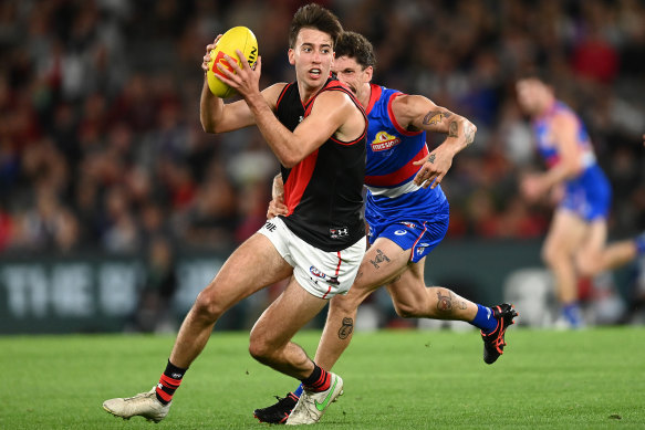 Nic Martin, who racked up 24 touches against the Bulldogs in round seven, will remain with the Bombers until 2024.