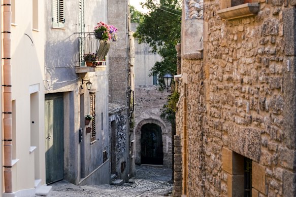 An ancient medieval cobblestone backstreet in Erice, a charming village set at 750 metres above sea level. 