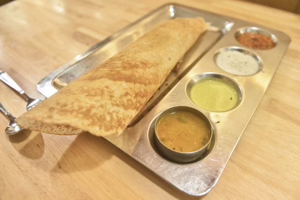 Gibson’s “excellent” masala dosa with dipping chutneys. 