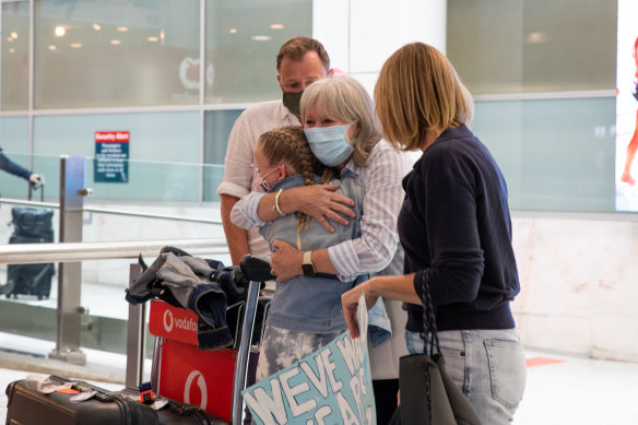 Hillary Baker was received by her son, daughter-in-law and granddaughter, who are just happy she got to Sydney, even with the snap isolation rules. 