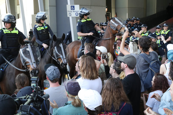Mounted police face off with protesters at the International Mining and Resources Conference in Melbourne last week. 