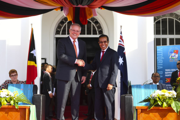 Prime Minister Scott Morrison, left, and East Timorese PM Taur Matan Ruak during a ceremony for the ratification of the maritime boundary treaty between Australia and East Timor in Dili last year.
