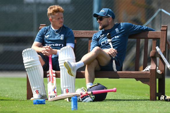 Building relationships: Brendon McCullum chats with Ollie Pope during a nets session.