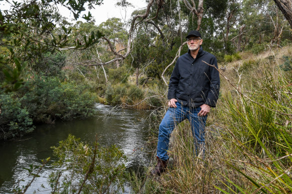 Cameron Steele by the Moorabool River near Meredith. He is calling for a reduction in water extraction from the river.