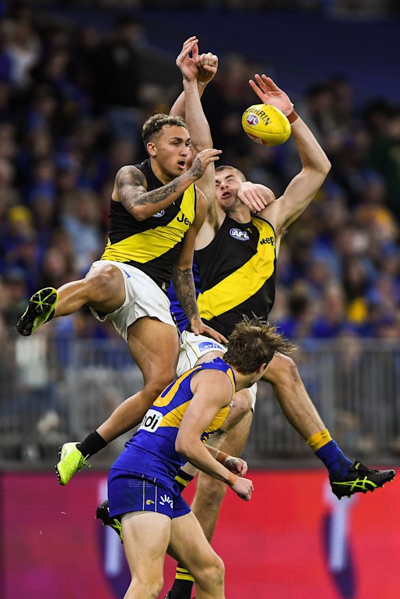 Shai Bolton attempts a high mark. 