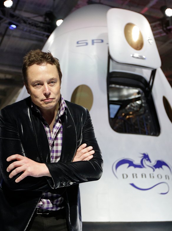 Musk in 2014 with  SpaceX Dragon V2 spacecraft.