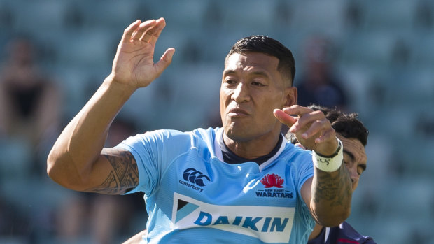 Aplomb: Israel Folau easily fields another bomb against the Rebels.
