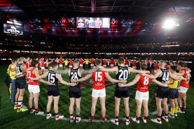 Players, coaches, and umpires will come together pre-game across the round of AFL matches this weekend.
