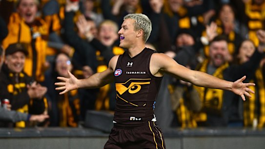 Jack Ginnivan plays it up to the crowd after the Hawks’ win over the Bulldogs.