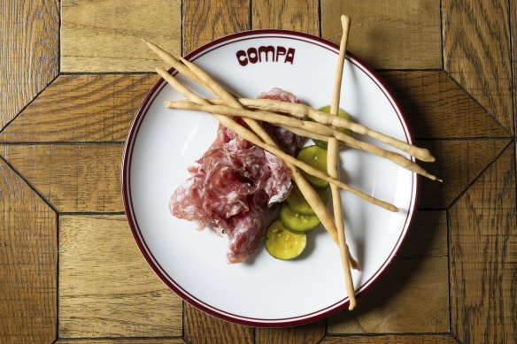 Moran Family Farm salami, zuni pickles and grissini.