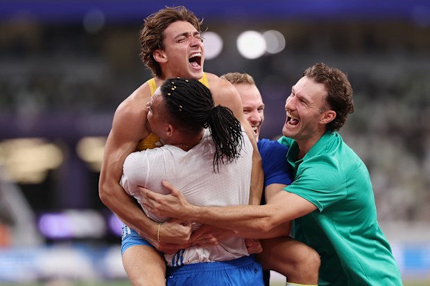 Armand Duplantis celebrates his latest world record with Emmanouil Karalis and Kurtis Marschall.