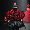 A model walks the runway at the Sheguang Hu Collection show during the 2024 Beijing Fashion Week.