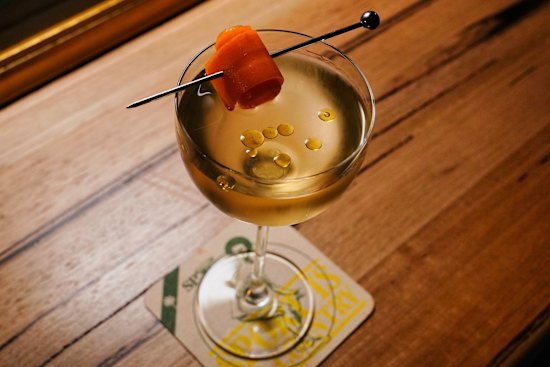 The Banh M(artini) features roast pork and pâté fat-washed vodka, gin, vermouth, and coriander oil.