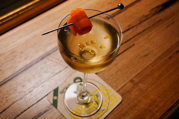 The Banh M(artini) features roast pork and pâté fat-washed vodka, gin, vermouth, and coriander oil.