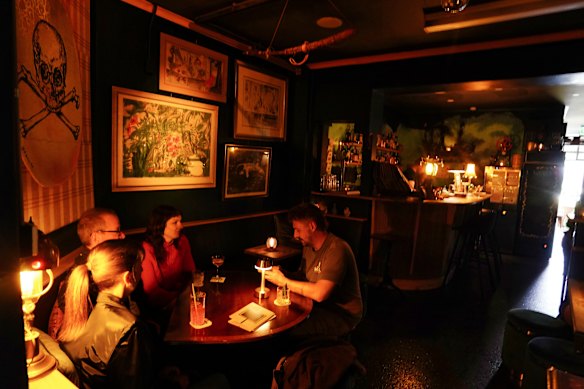 Inside the moody cocktail bar.