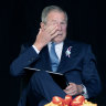 Former President George W. Bush, right, wipes his eyes next to former first lady Laura Bush, after he spoke at a memorial for the passengers and crew of United Flight 93 on September 11, 2021.