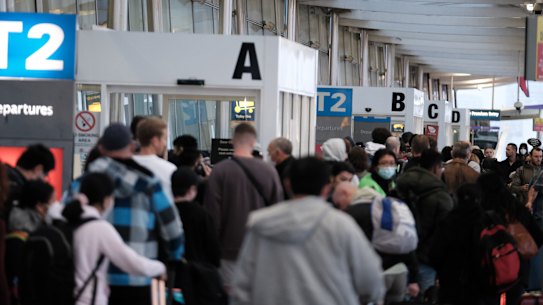 Queues snaking outside Sydney Domestic Airport’s Terminal 2 in July. 