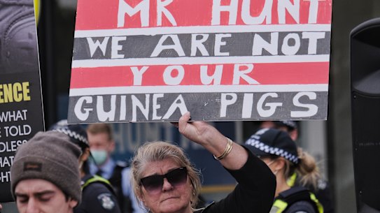 An anti-vaccination protest at Health Minister Greg Hunt’s office on Saturday.