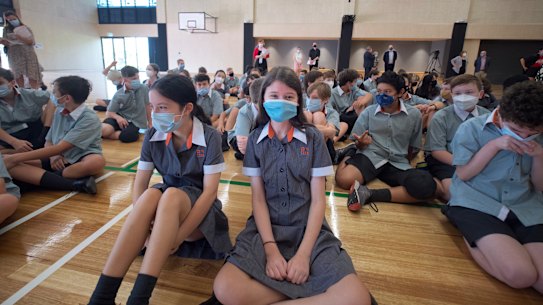 Masked Port Melbourne Secondary College students on Monday - their first day at school for 2022.
