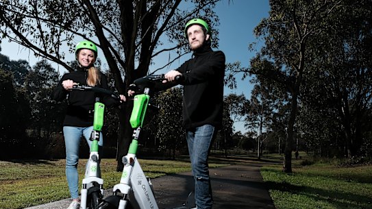 Ellen Black and Mark Brodie with Lime, one of several scooter rental companies about to begin a trial of e-scooters around Western Sydney Parklands and Mount Annan.