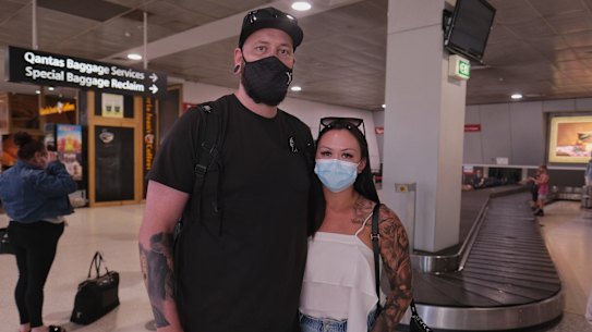 Michael Daffy and Justina Bryan at the Qantas terminal of Melbourne airport on Friday afternoon.