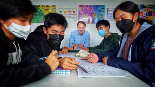 Tutor and former VCE chemistry teacher James Kennedy teaches year 9 and 10 students at his tuition centre.   