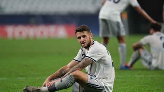 A dejected Jake Brimmer after Melbourne Victory crashed out of the Champions League.