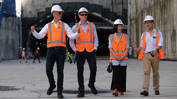 From left: Transport Minister John Graham, NSW Premier Chris Minns, Deputy Premier Prue Carr and Strathfield MP Jason Yat-Sen Li at the excavation and construction site of Burwood North Metro Station in April.