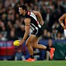 Scott Pendlebury of the Magpies in action.