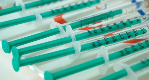 Syringes filled with doses of the AstraZeneca vaccine at a private medical practice in Germany. 