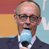 Friedrich Merz, front right, leader of the Christian Democratic Union, gestures while addressing supporters at the party headquarters in Berlin.