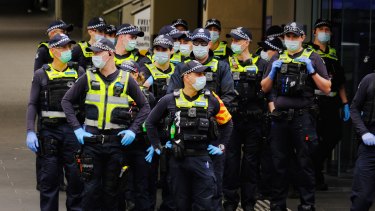 Police patrol in Melbourne on Friday. More anti-lockdown protests are expected this weekend.