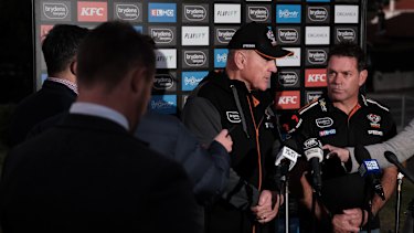 Tim Sheens and Brett Kimmorley front the cameras on Tuesday evening after the decision to sack Maguire.