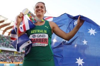 Kelsey-Lee Barber with the prize after defending her world javelin title.