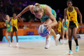 Kate Moloney dives to keep the ball in play against Jamaica.