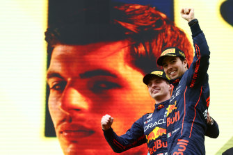 Winner Max Verstappen and  runner-up Sergio Perez, both of Oracle Red Bull Racing, celebrate on the podium in Imola, Italy on Sunday. 