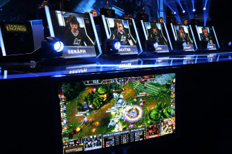Competitors play in a League of Legends championship series competition