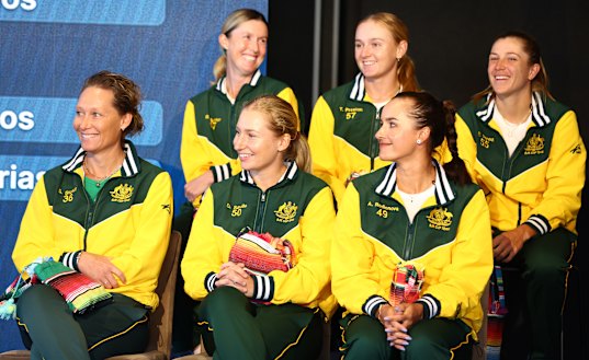 Taylah Preston (middle, second row) with Billie Jean King Cup Australian captain Sam Stosur (bottom left) and her teammates.