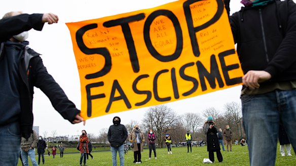 Demonstrators observe social distancing at an anti-fascism demonstration in Amsterdam, Netherlands, on Sunday, to protest the storming of the US Capitol by a violent mob loyal to President Donald Trump.