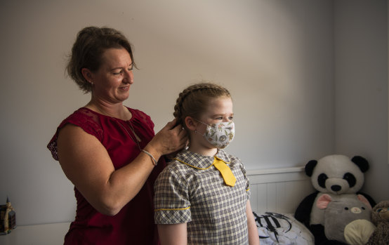 Vaccinations and masks may influence how long a student will have to isolate 