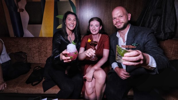 Joel Bainbridge, Phoebe Askham (centre), and Sascha Mocerino enjoying a cocktail at Nick and Nora’s.